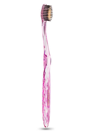 Produktbild - Novacare Zahnbürste mit Gold und Bambuskohle in der Farbe "Pink"